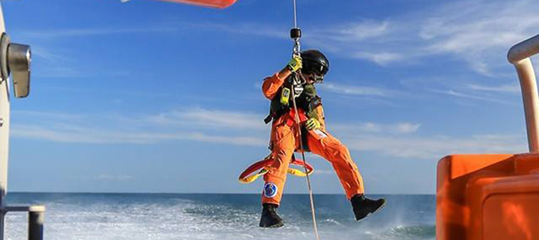 Volunteers rescue man adrift on inflatable in the dark