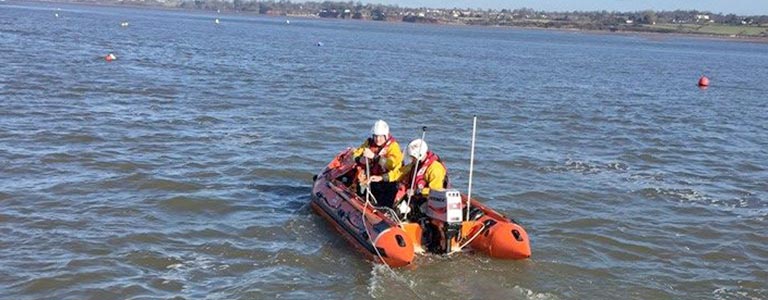 Exmouth RNLI rescue two people stuck in mud by the Duck Pond