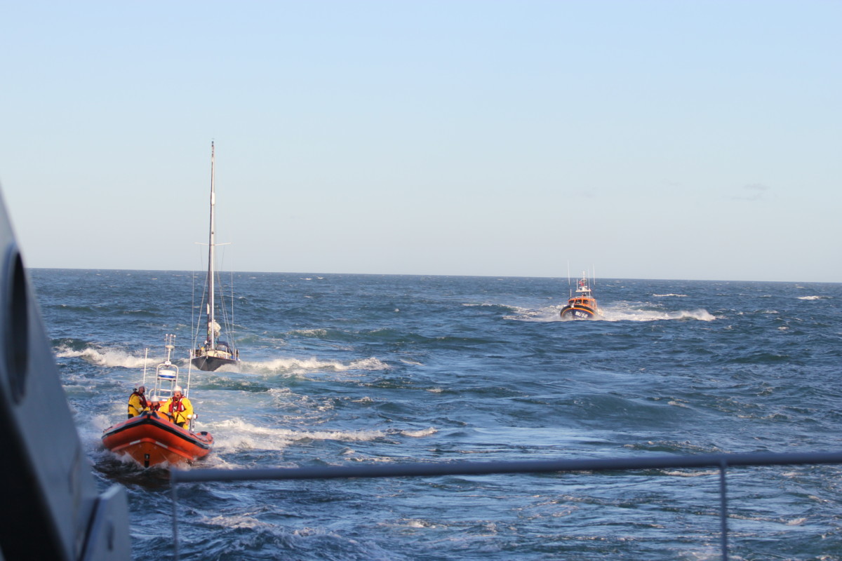 Teignmouth and Exmouth RNLI lifeboats help two people in difficulty on a yacht