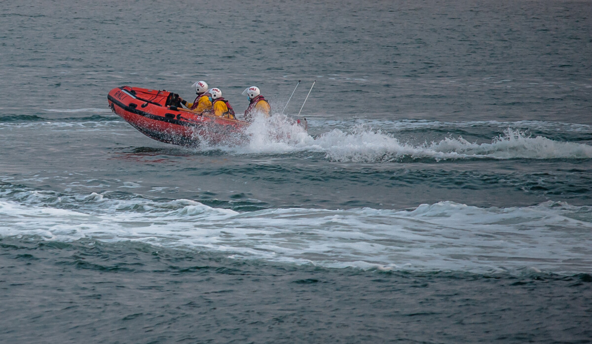 Exmouth RNLI called to report of two stranded on  beach